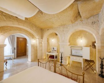 Tafoni Houses Cave Hotel - Urgup - Schlafzimmer