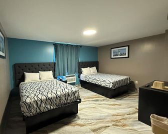 Beauty Rest Hotel - Edison - Ložnice