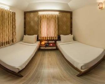 Nimba Wellness Retreat - Mahesāna - Bedroom