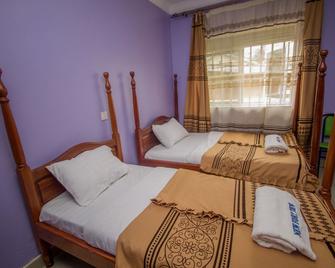 New Fortview Hotel - Nkingo - Bedroom