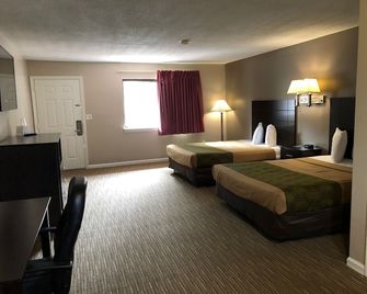 Rodeway Inn - Groton - Bedroom