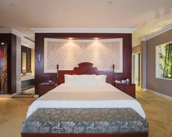 Golden Dome International Hotel - Mudanjiang - Habitación