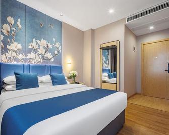 Greentree Inn Hefei Shuanggang Yilijing Metro Station - Hefei - Slaapkamer