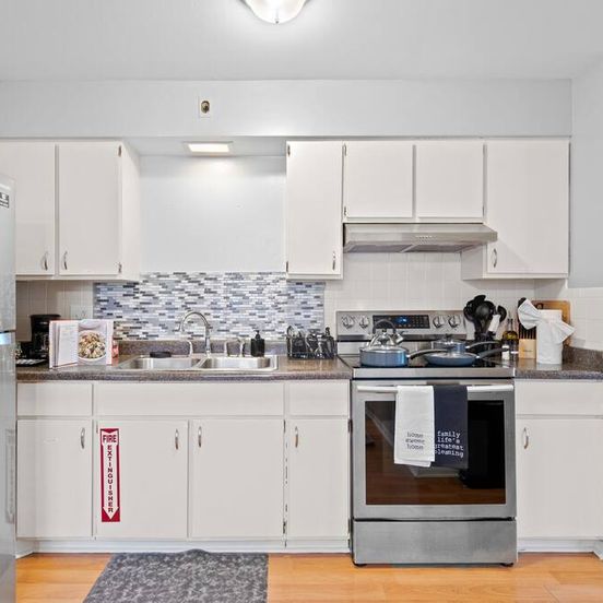 Kitchen view of Chic Suite/Mins to L Train /Laundry/Free Parking