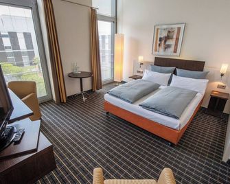 Livenwork Hotel & Coworking Gvz Ingolstadt - Ingolstadt - Bedroom