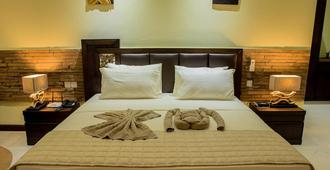 Oasis Hotel Restaurant & Spa - Grand'Anse Praslin - Bedroom