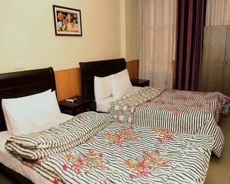 Swiss Cottage Hotel - Islamabad - Schlafzimmer