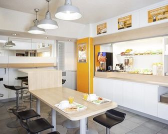 Unisotel Colmar Parc Des Exposition Ex F1 - קולמר - חדר אוכל