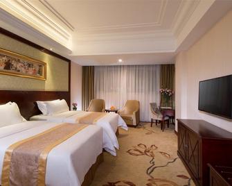 Vienna Hotel Zhongshan Xiaolan - Zhongshan - Ložnice