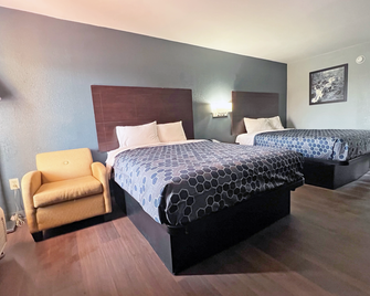 Red Carpet Inn & Suites - Newnan - Schlafzimmer