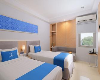 Hotel Laksana Solo Managed By Dafam - Surakarta City - Bedroom