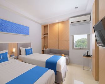 Horison Inn Laksana Solo - Surakarta - Slaapkamer