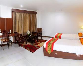Airport City Hotel - Calcuta - Habitación