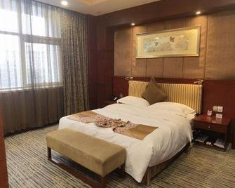 Jinniu Grand Hotel - Xingtai - Schlafzimmer