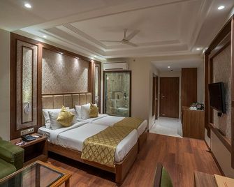 Hotel Shri Ram Excellency - ג'ודפור - חדר שינה