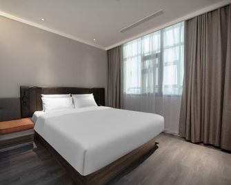 Hanting Hotel (Tangcheng Road, Lingcheng District, Dezhou) - Dezhou - Bedroom