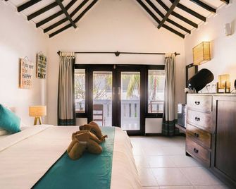 Tír na nÓg Beachfront Resort - Mataram - Habitación