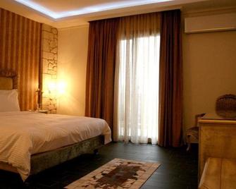 Diamond River Resort & Spa - Maniaki - Bedroom