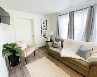 Suite 102 | 2 Bedroom / 2 Bath + Living & Kitchen - Sault Ste. Marie - Living room