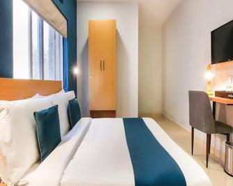 Poluru Grand Inn - Tirupati - Bedroom