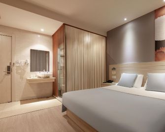 Hui 8 Chain Hotel (Shaoxing Diyang) - Shaoxing - Schlafzimmer