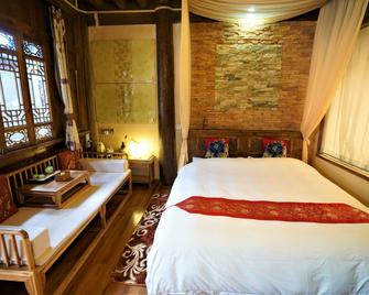 Lijiang Lvyeanjia Inn - Lijiang - Bedroom