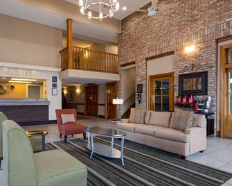 SureStay Plus by Best Western Covington - Covington - Living room