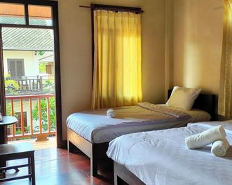 Tingkham Guesthouse - Luang Prabang - Bedroom