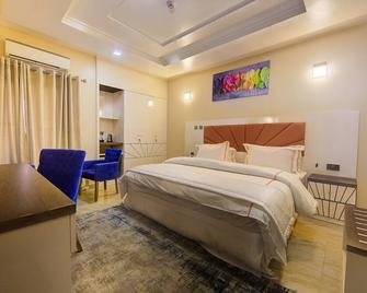 Musada Luxury Hotels and Suites - Abuja - Bedroom