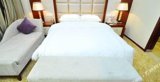 Linyi Hotel (Yimeng Road) - Linyi - Schlafzimmer