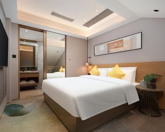 Mu Lan Zun Yue Hotel (Guiyuan Temple Branch, Wuhan National Expo Center) - Wuhan - Habitación