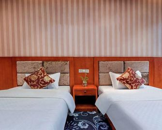 Muya Hotel (Xinshan Village Dadukou Pedestrian Street Branch) - Chongqing - Habitación