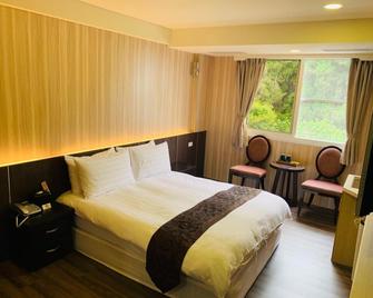 Dafong Hotel - Alishan Township - Bedroom