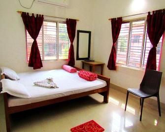 Lipika Lodge - Bolpur - Bedroom