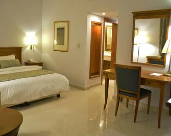 Guest House Amman Hotel - Amman - Phòng ngủ
