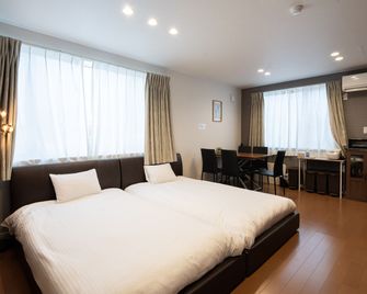 The Peak Villa Suite Hokkaido - Higashikawa - Schlafzimmer