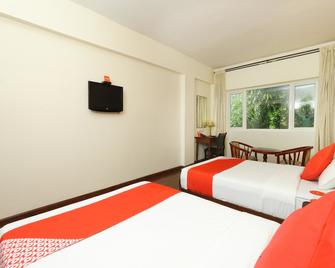 OYO 15925 Tommaso Hotels And Resorts - Srīperumbūdūr - Спальня