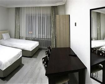 Onem Otel & Pansiyon - Sivas - Yatak Odası
