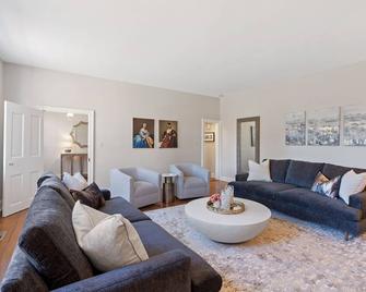 Experience the heart of downtown, where historic charm meets modern comforts. - Huntsville - Living room