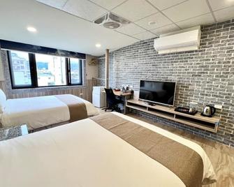 Da XI Lao Cheng Si Ji Xing Guan - Taoyuan City - Bedroom