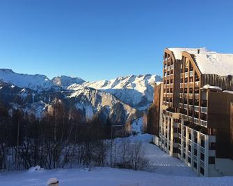 Appt summer / winter foot of Alpe d'Huez balcony pool sauna covered parking - Huez - Salon