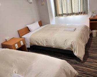 Hotel Kurume Hills - Kurume - Schlafzimmer