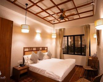 Shanti Inn Dormitory - ורנאסי - חדר שינה