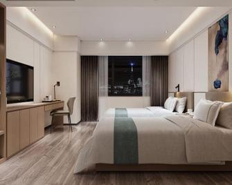 Liu Zhou Huaxi Hotel - Liuzhou - Habitación