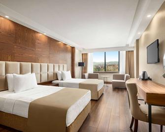 رامادا بلازا باي ويندام سامسون - سامسون - غرفة نوم