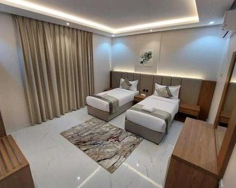 Dancenter Doolv Serviced Apartments Tabuk - Tabuk - Bedroom