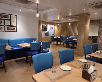 Hotel Gulmohar Grand - Jorhāt - Restaurante