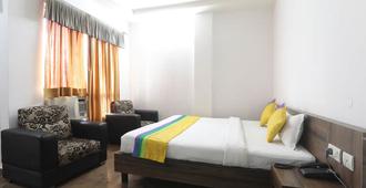 Hotel Global Inn - Lucknow - Schlafzimmer
