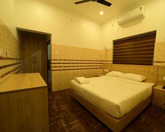 Vrindavan Resort and spa - Payyanur - Bedroom