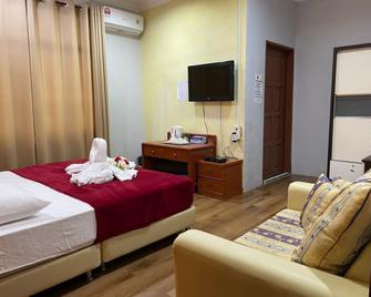 Samudera Hotel - Kuala Besut - Slaapkamer